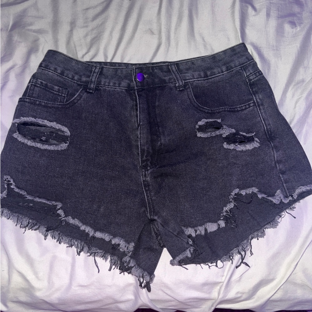 black ripped jean shorts